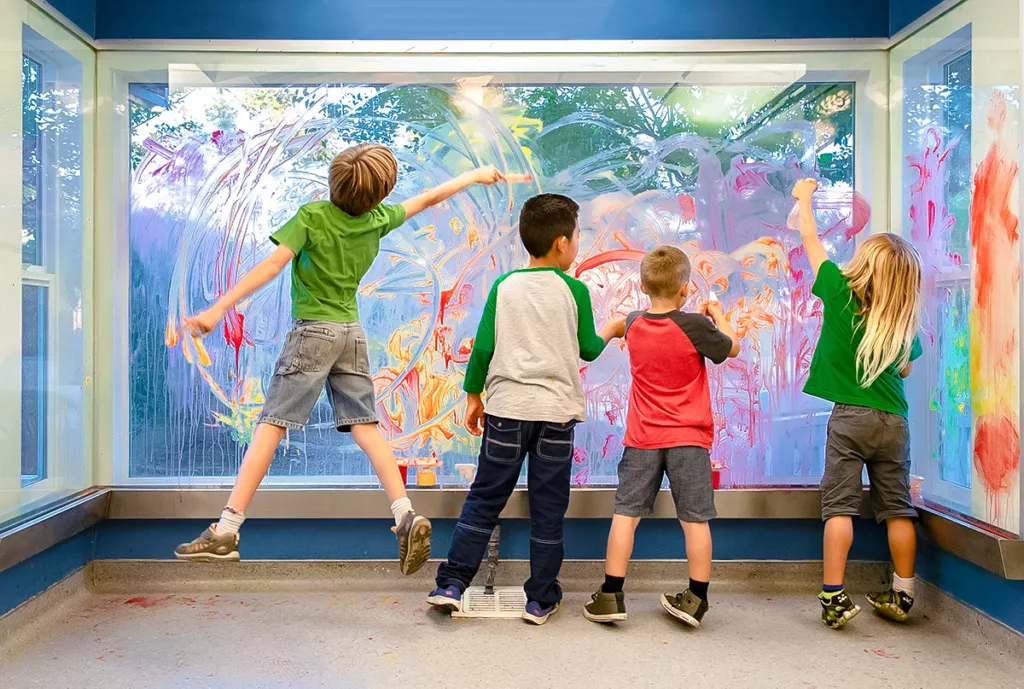 Kids engaging in hands-on arts and crafts activities